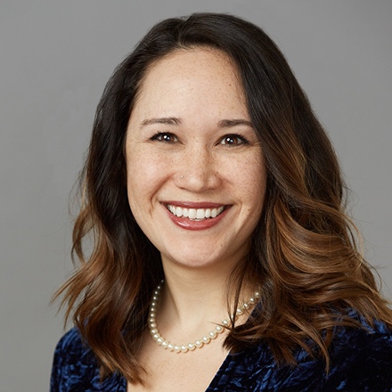 A close-up of a person smiling

Description automatically generated